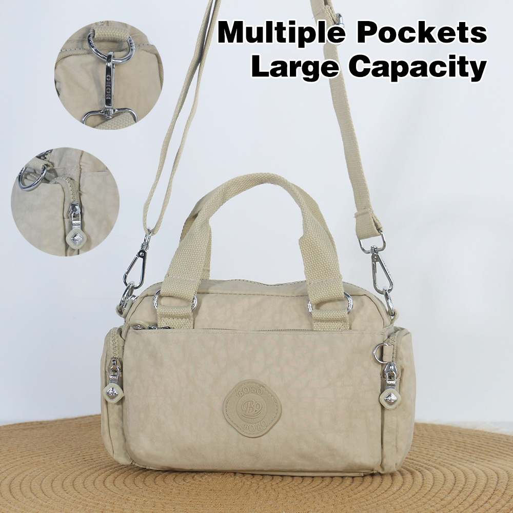Women Bags Manufacturer - 女性用のファッショナブルなクロスボディバッグ、大容量のマルチポケットハンドバッグ、高品質のナイロン素材。