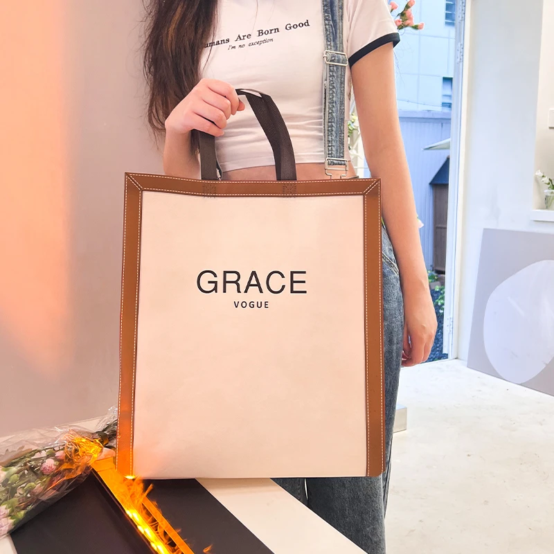 10 個不織布ショッピングトートバッグ女性環境に優しい布生地 - Women Bags For Eid のレビューと価格